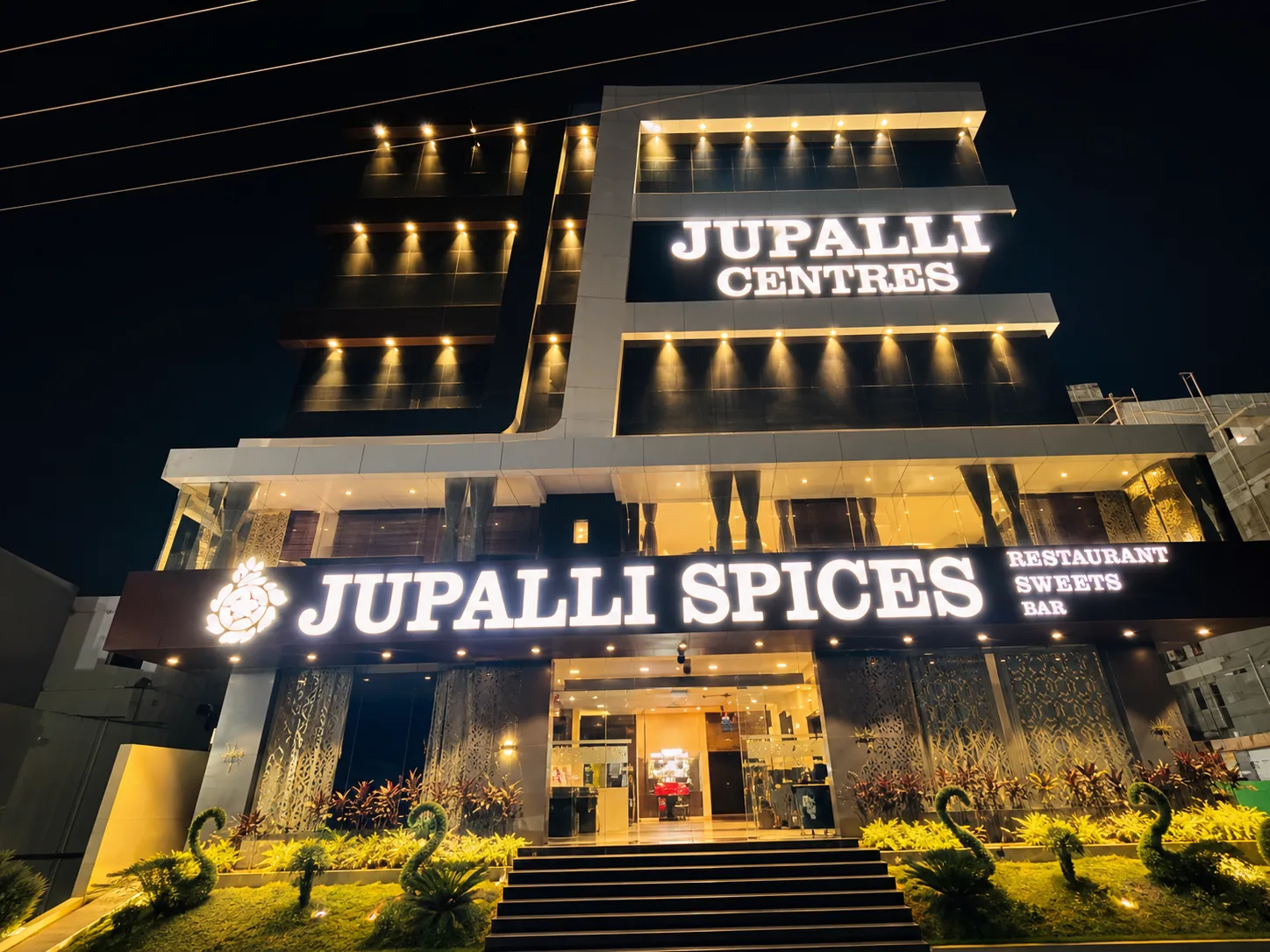 Hotel Jupalli Spices enhanced front elevation at night
