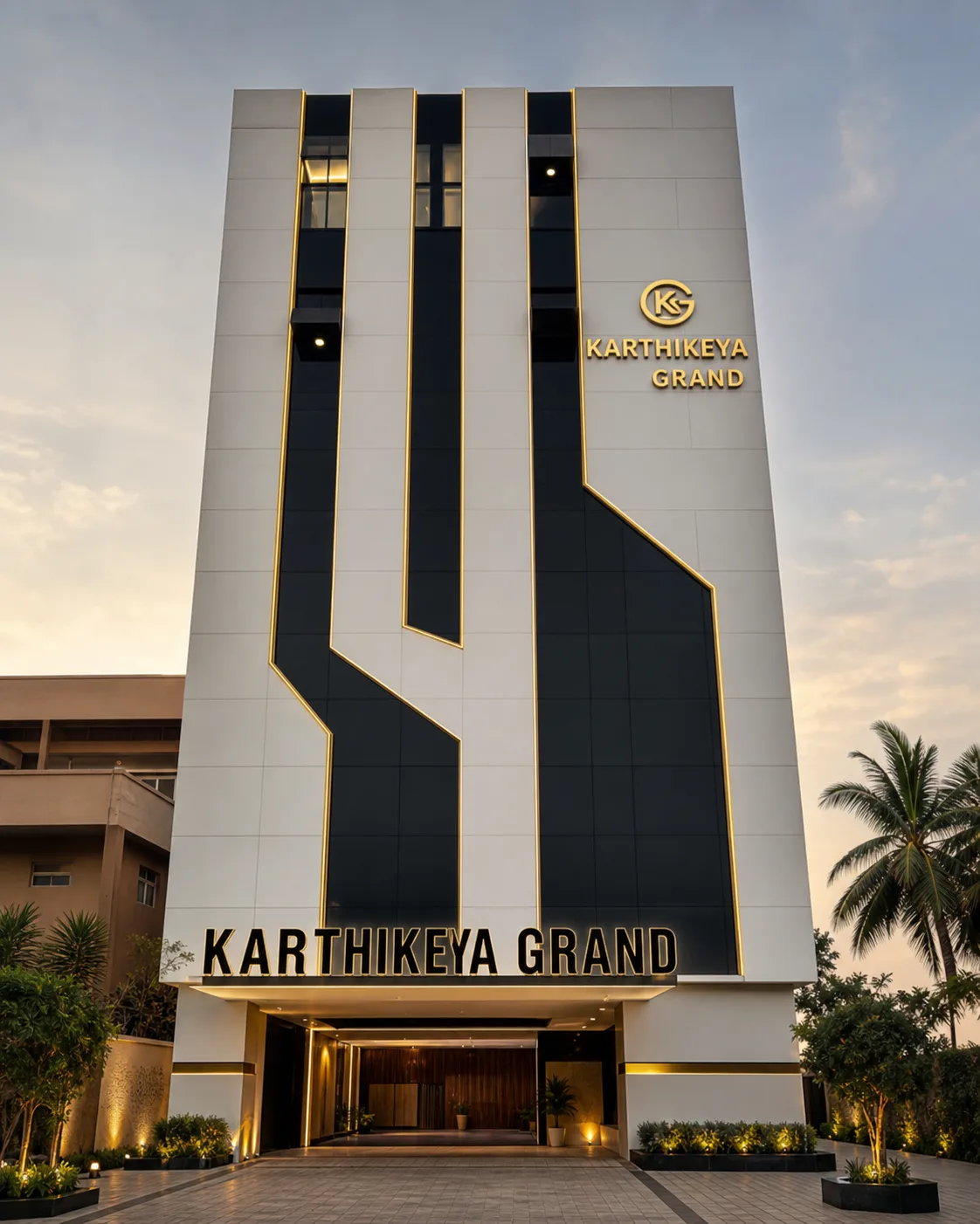 Karthikeya Grand hotel facade with black, white, and gold detailing