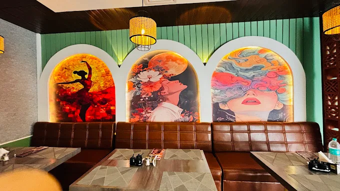 RK Punjabi Dhaba mural arch and booth seating detail